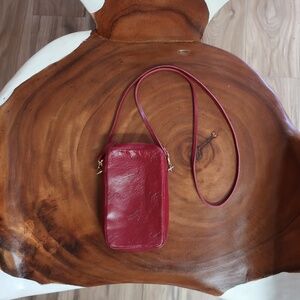 Clare V. Poche Sportif in Rustic Oxblood Tiger